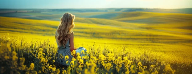 Rolgordijnen Peace and relaxation. Away in Vast fields of beauty. Rapa or rapeseed field in full bloom. © killykoon