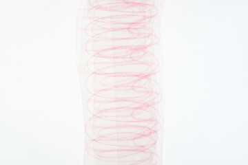 overlapping coil color pencil marks (with patterned lines) on tracing paper