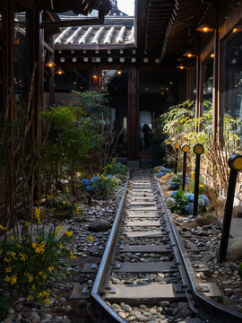 Seoul, South Korea - March 13, 2023: Railroad inside the trendy Nakwon Station Cafe in Ikseondong Hanok village