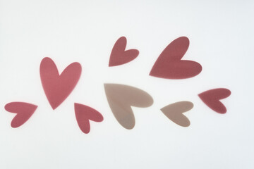 wooden hearts under tracing paper