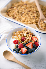 homemade granola with berries and yogurt