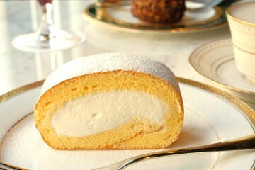 piece of swiss roll cake on a plate