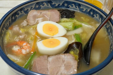 Chinese-style stir-fried vegetable noodle soup
