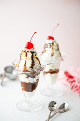 ice cream sundae with cherries and nuts