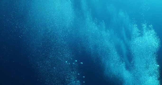 air bubbles slow  underwater coming up scenery dark blue and sun shine ocean scenery from scuba  divers backgrounds