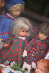 Old retro kinds puppets in forgotten from time kids shop close up background high quality big size...