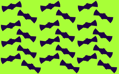 Fototapeta premium Pattern of blue bowties on a green background.
