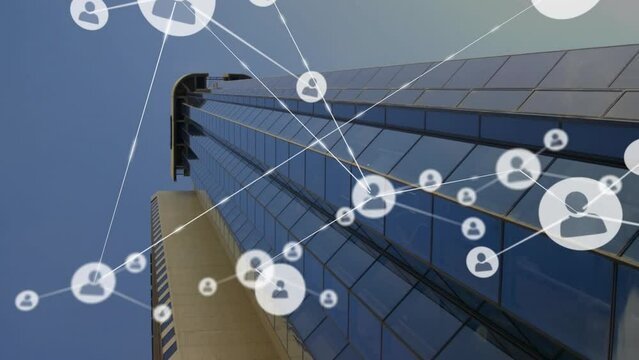 Animation of network of connections with people icons over skyscraper