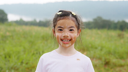 Little cute alpha young albino vitiligo small school girl relax smile look at camera. Real melanin...