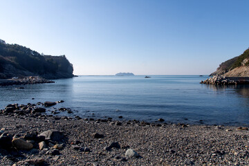 Fototapeta na wymiar Seascape with the beach and cliffs