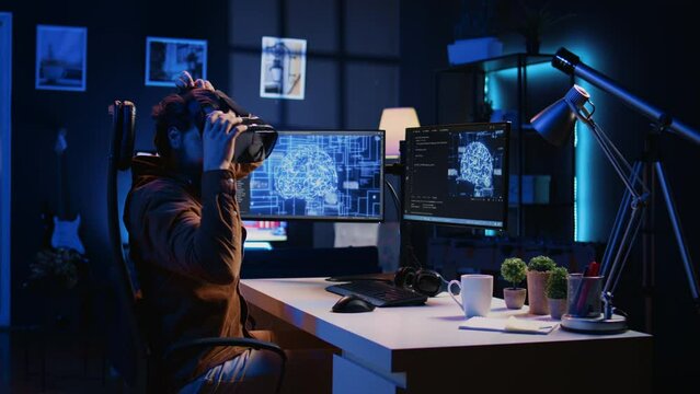 Computer scientist wearing VR glasses panicking after AI gains omniscience, throwing goggles and programming firewall. Programmer afraid by artificial intelligence gaining enlightenment, camera B