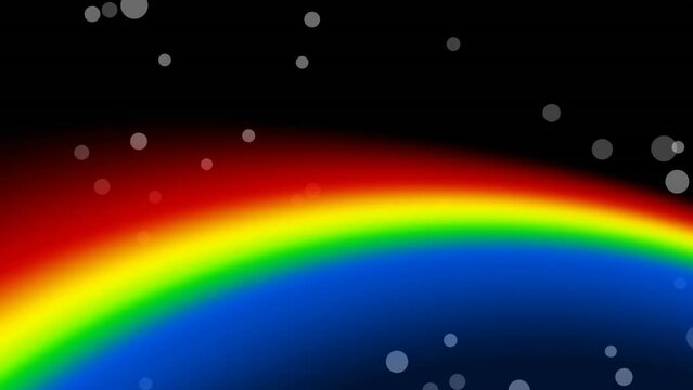 Animation of floating spots over rainbow on black background
