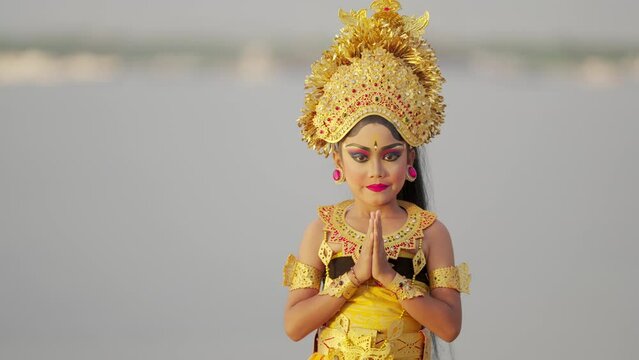 Portrait of young balinese girl dancer, southeast asian culture and tourism
