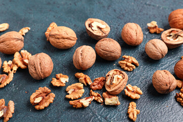 Natural walnuts on black background