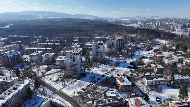 Aerial footage of Zapaden neighborhood on a sunny winter day in Sofia the capital city of Bulgaria