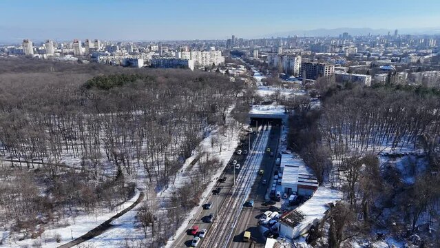 Aerial view of vehicles driving on bul. "Tsaritsa Yoanna" on a sunny winter day in Sofia, Bulgaria