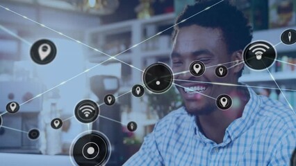 Animation of network of connections with wifi cons over african american man in cafe
