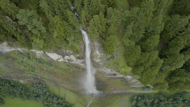 Waterfall over Switzerland cliff - Drone Shot