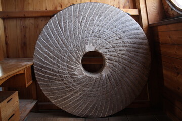 Stone wheel of water mill closeup