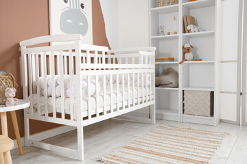 Interior of children's bedroom with baby crib and shelf unit - obrazy, fototapety, plakaty