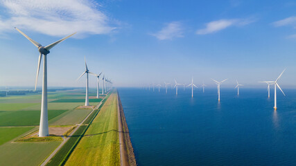 An aerial view of a wind farm on a plain in the middle of the ocean, with wind turbines reaching up towards the sky, blending into the natural landscape of water and clouds