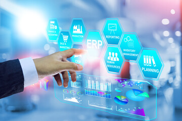 ERP Enterprise Resource Planning concept with businessman pointing on virtual screen to operate...