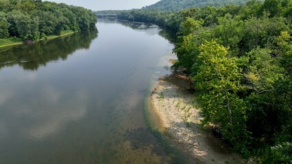 Potomac river gently flowing in peaceful countryside in Maryland, Virginia state line