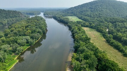 Fototapeta na wymiar Potomac river gently flowing in peaceful countryside in Maryland, Virginia state line