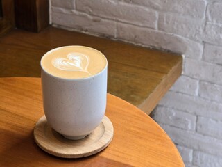 Heart shape milk foam latte art coffee on minimal cup - 744364964