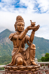 Fototapeta premium Statues presenting gifts to the Tian Tan Buddha, Ngong Ping, Lantau Island