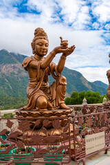 Fototapeta na wymiar Statues presenting gifts to the Tian Tan Buddha, Ngong Ping, Lantau Island