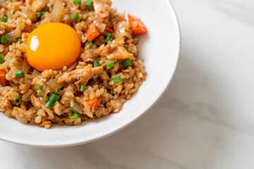 salmon fried rice with pickled egg on top