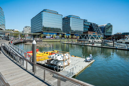 WASHINGTON D.C., USA - April 9, 2023 :   Kayaks and paddleboards rental at recreation pier in the Wharf, modern mixed-use development on the Southwest Waterfront in Washington, D.C