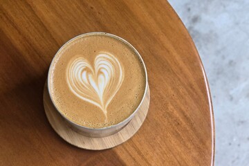 Heart shape draw by milk foam on latte art coffee cup - 744380120