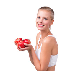 Happy, woman and portrait with apple for nutrition benefits in diet on white background in studio. Girl, smile and eating fruit for detox of digestion and food with vitamin C and fiber for gut health