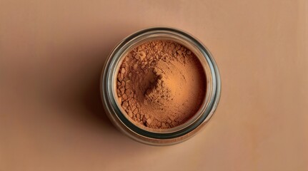 Jar of brown powder on a delicate pastel brown background. Top view. Generated by AI.
