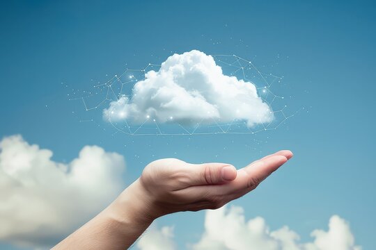 Conceptual image of a hand holding a virtual cloud, representing cloud computing and technology.