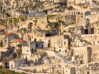 Fototapeta na wymiar Matera Italy - old stone houses and cave dwellings (sassi). Historical village (town) and UNESCO heritage site in Europe.