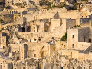 Fototapeta premium Matera Italy - old stone houses and cave dwellings (sassi). Historical village (town) and UNESCO heritage site in Europe.