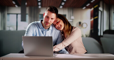 Couple Doing Taxes And Family Budget