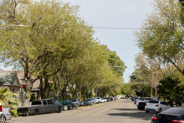 Afternoon sun shines on a suburban neighborhood of single family homes near downtown Tracy, California, USA.