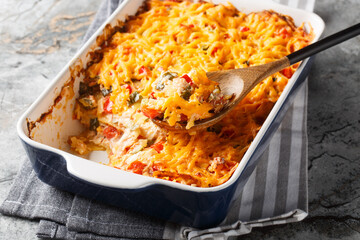 King Ranch Chicken Casserole, Tex-Mex dish of layered tortilla pieces and chicken in a spicy,...