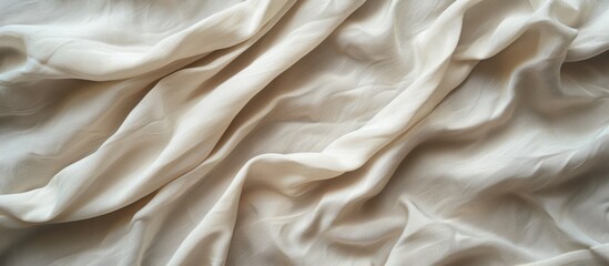 Fototapeta premium Soft and luxurious white fabric with an incredibly smooth texture for elegant designs