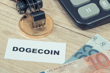 Dogecoin, euro bills, miniature excavator and calculator. Cryptocurrency. International network payment. Finance concept