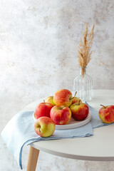 ripe red apples on the table
