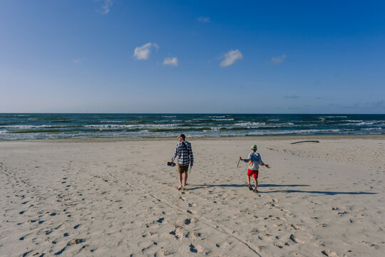 Father and son at the summer beach