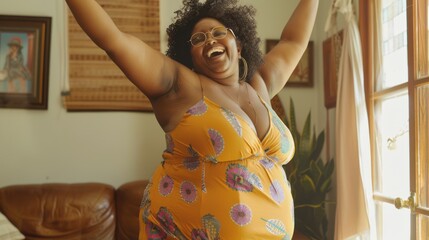 Fototapeta na wymiar A plus-sized Black woman exudes happiness and positivity as she dances enthusiastically in her home environment.