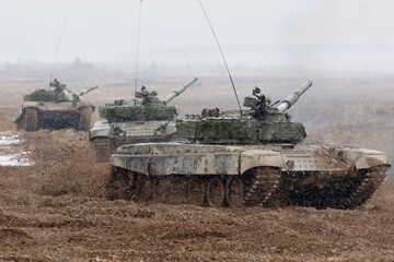 Tank is driving through the range