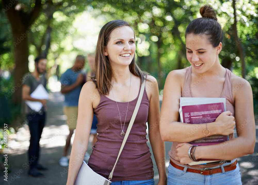 Canvas Prints Happy, student and walking on campus with education, learning and books for knowledge in university. Young women or friends talking outdoor, park or college for scholarship, study and collaboration