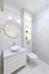 Fototapeta na wymiar Modern Bathroom Interior. Bathroom Sink, Decoration and Mirror. Shower Glass. Luxury Home